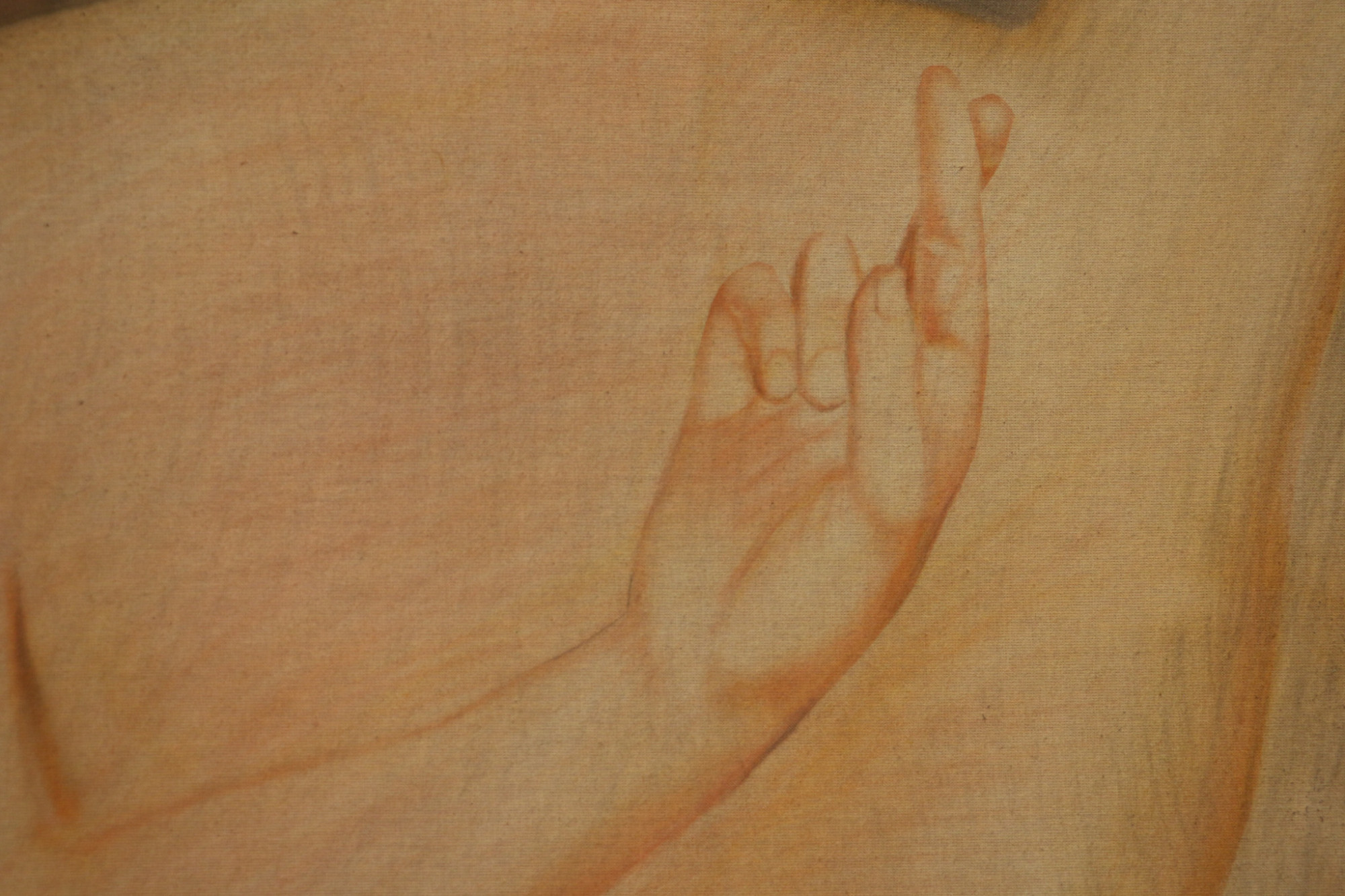 A detail of a painting which shows a persons back with on of their hands held up crossing their fingers.