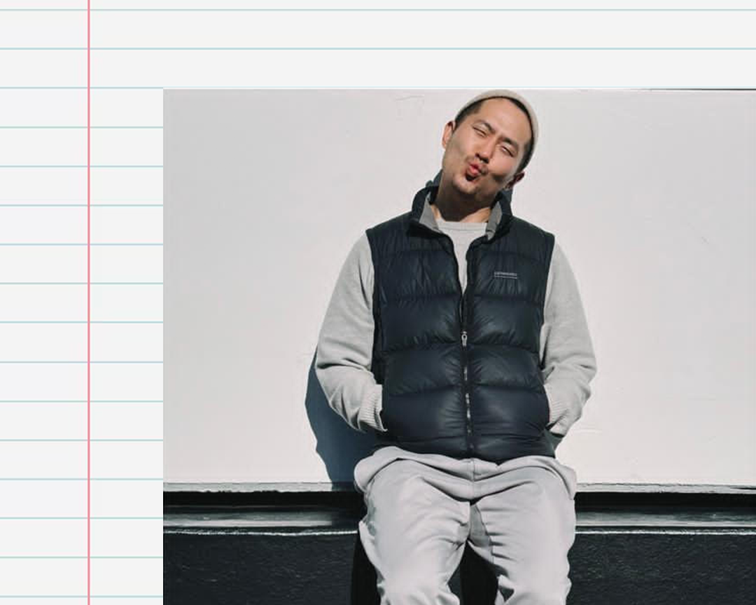 A headshot of Sung Hwan Bobby Park on an exercise book paper background