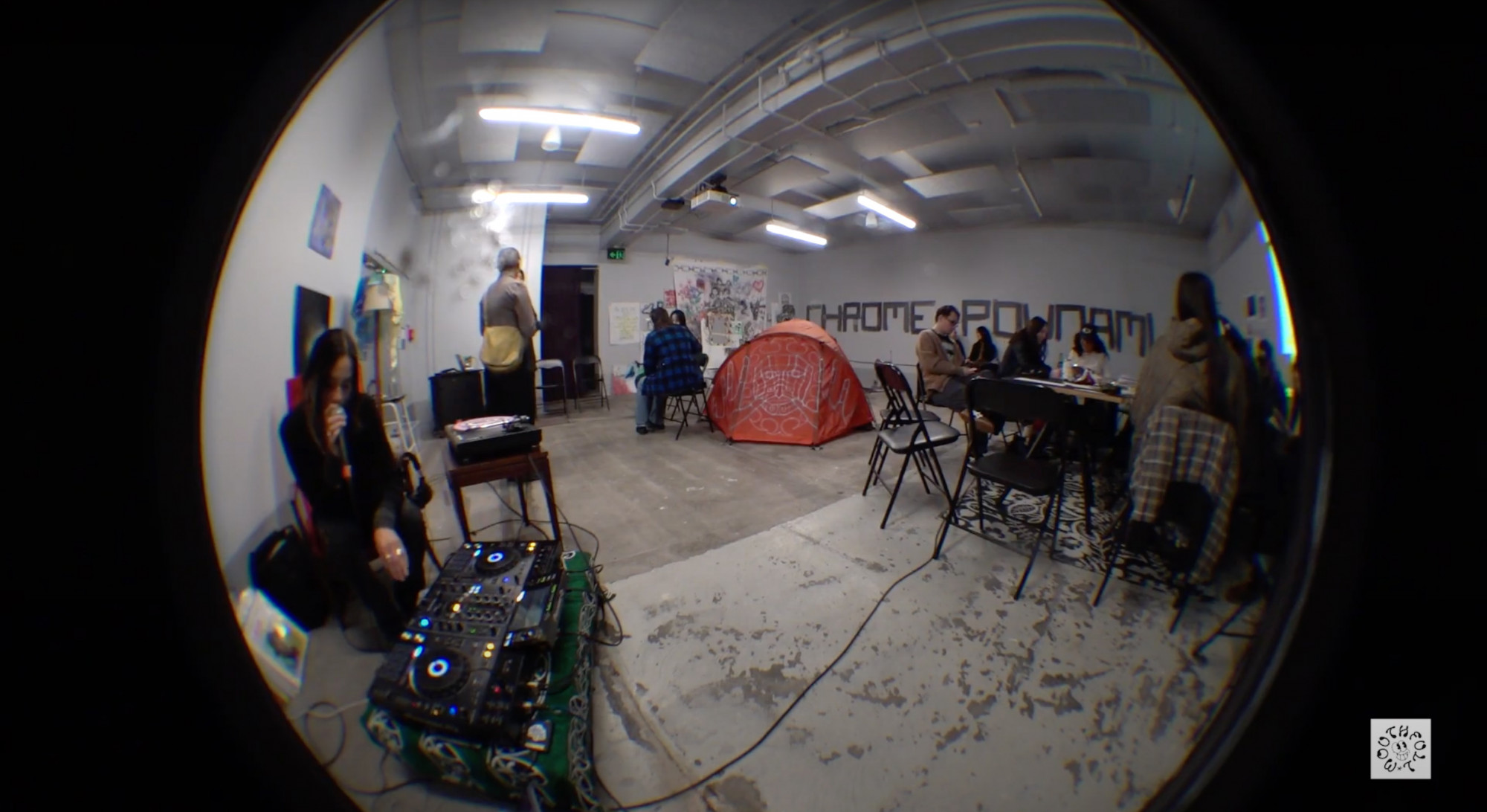 A fish eye image of the DJ station taken from the corner of the room.